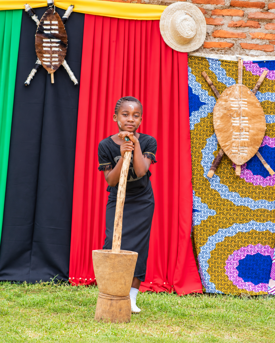 Learner posing during a cultural presentation